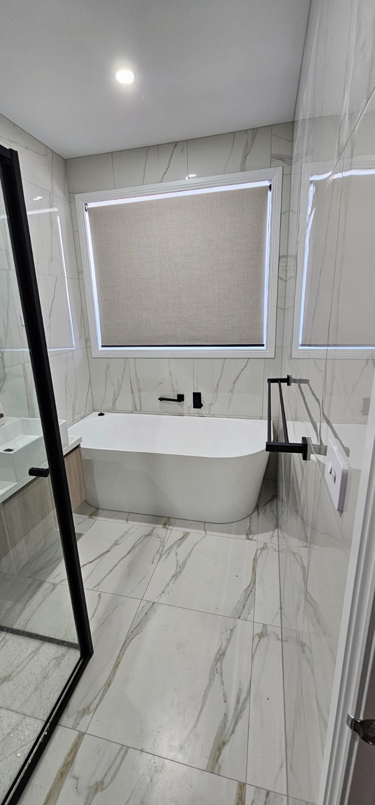 Bedroom with privacy curtains